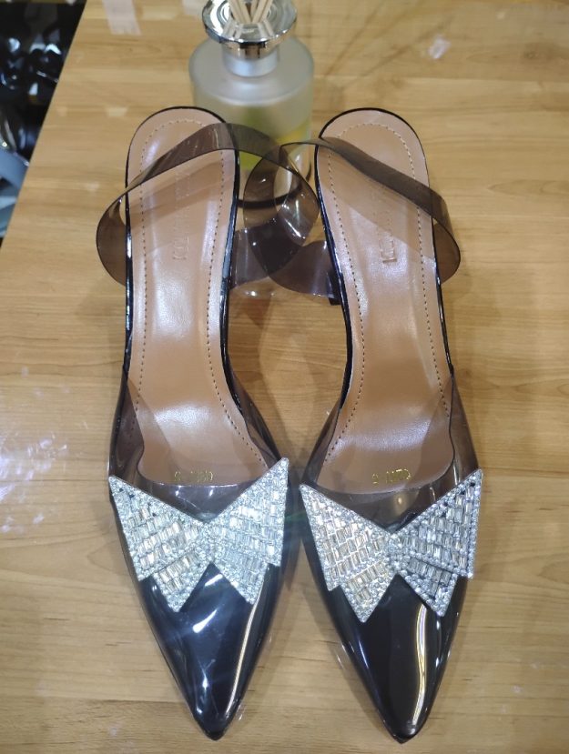 Women’s Transparent Pointed-Toe Mules with Rhinestone Bow Detail