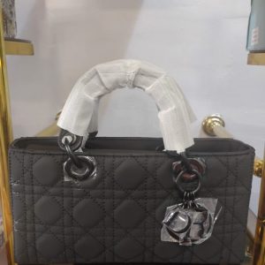 Elegant Black Quilted Handbag with Charm Detailing – Classic Structured Tote for Women