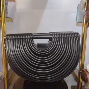 Elegant Black Half-Moon Handbag for Women – Unique Round Handle Purse with Modern Textured Design